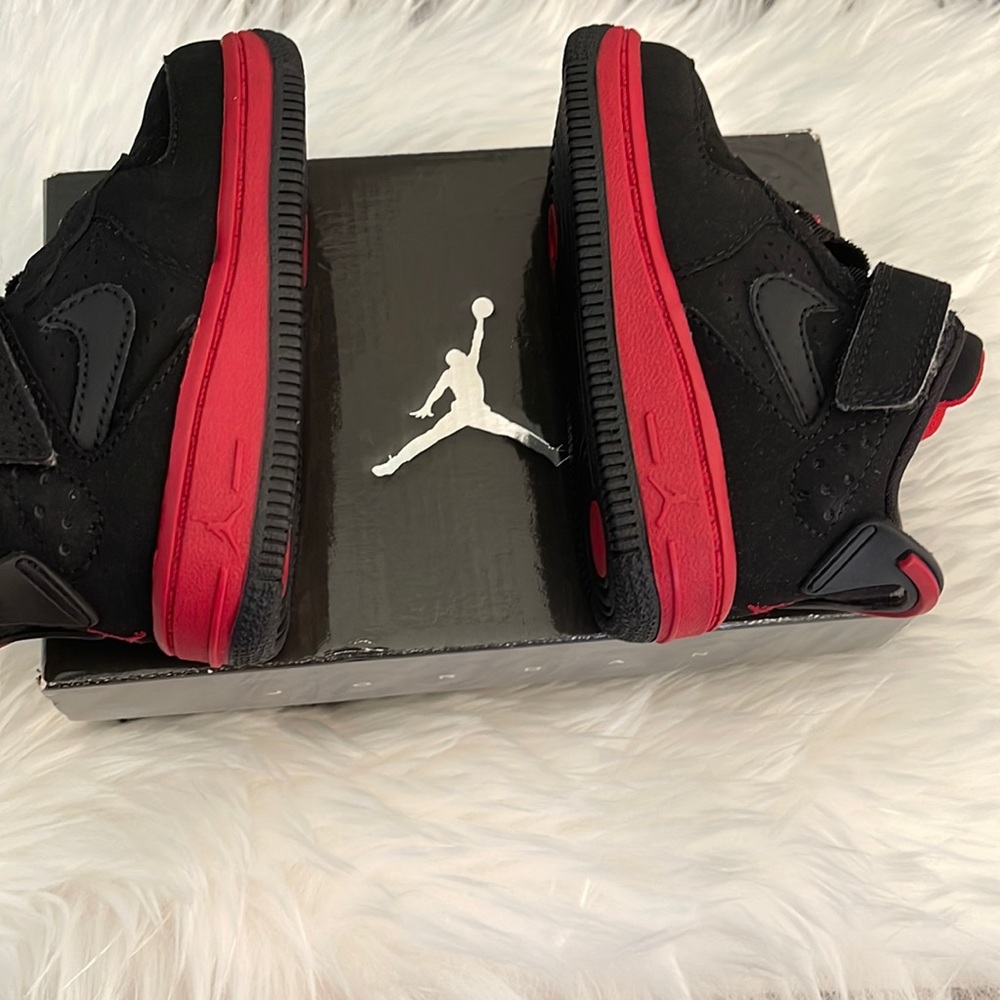 In Excellent condition Air Jordan in Black/Varsity Red US Size 5C